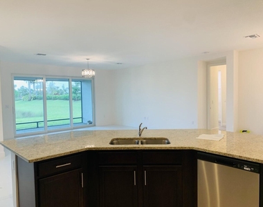 11933 Sw Poseidon Way - Photo Thumbnail 4