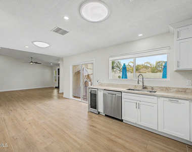8711 E Latham Street - Photo Thumbnail 6