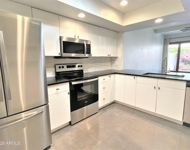 8 W Griswold Road - Photo Thumbnail 6
