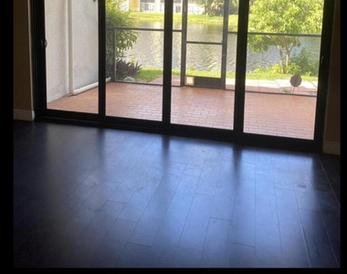 6557 Racquet Club Drive - Photo Thumbnail 1