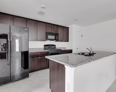 8617 Thicket Ridge Street - Photo Thumbnail 16