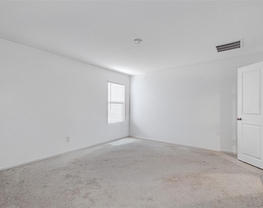 8617 Thicket Ridge Street - Photo Thumbnail 3
