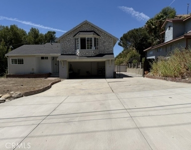 10459 Haines Canyon Avenue - Photo Thumbnail 1