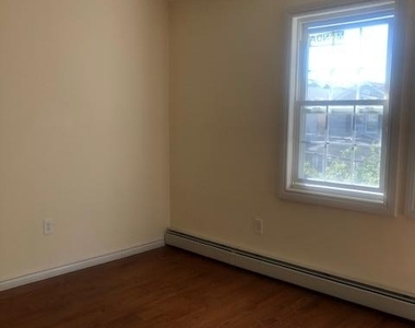 88-05 91st Avenue - Photo Thumbnail 4