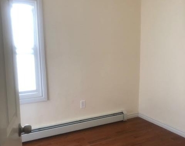 88-05 91st Avenue - Photo Thumbnail 10