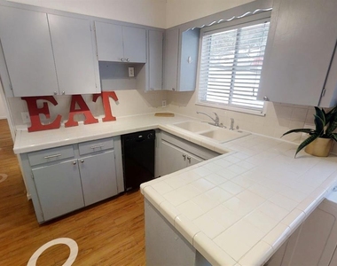 3011 Whitis Ave - Photo Thumbnail 3