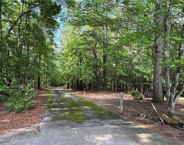 8911 Daerwater Drive - Photo Thumbnail 22