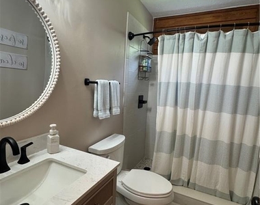 8911 Daerwater Drive - Photo Thumbnail 12