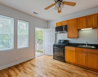 1234 W 49th Place - Photo Thumbnail 4