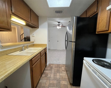 3909 Tanglewilde Street - Photo Thumbnail 3