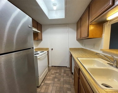 3909 Tanglewilde Street - Photo Thumbnail 2