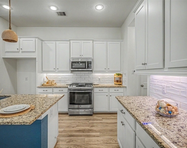 6019 Dovetail Cliff Court - Photo Thumbnail 10