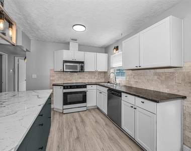 839 13th Avenue Sw - Photo Thumbnail 2