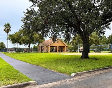 9842 Lake Chase Island Way - Photo Thumbnail 25