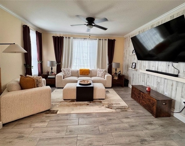 9842 Lake Chase Island Way - Photo Thumbnail 1