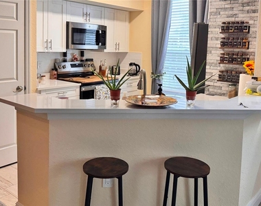 9842 Lake Chase Island Way - Photo Thumbnail 2