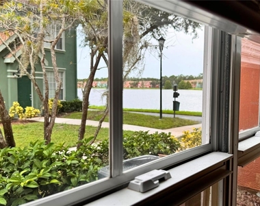 9842 Lake Chase Island Way - Photo Thumbnail 5