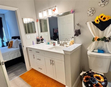 9842 Lake Chase Island Way - Photo Thumbnail 6