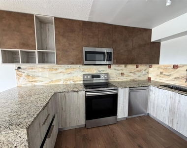5317 Curry Ford Road - Photo Thumbnail 2