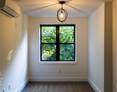 828 St Johns Place - Photo Thumbnail 2