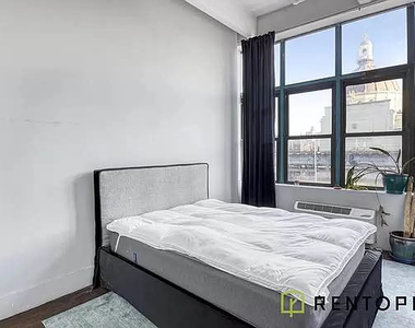 808 Driggs Avenue - Photo Thumbnail 3