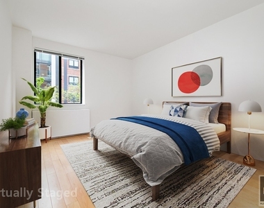 West 53 Street - Photo Thumbnail 2