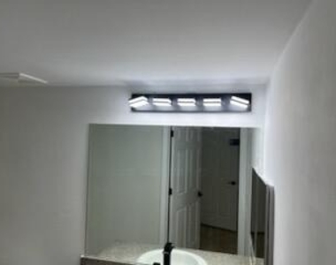 5011 Wiles Road - Photo Thumbnail 8