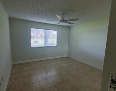 5011 Wiles Road - Photo Thumbnail 20