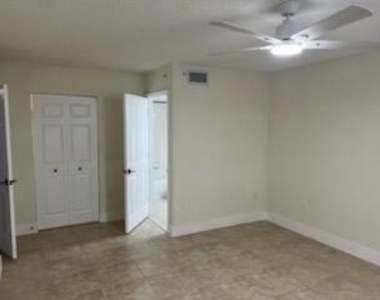 5011 Wiles Road - Photo Thumbnail 7