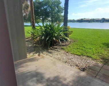 5011 Wiles Road - Photo Thumbnail 14