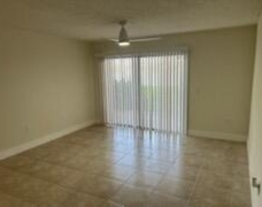 5011 Wiles Road - Photo Thumbnail 5