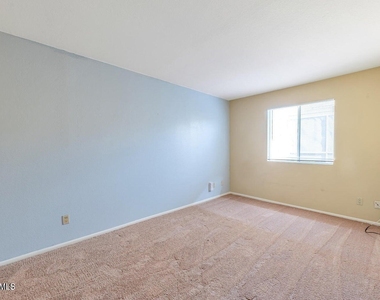 10720 E Mercer Lane - Photo Thumbnail 12