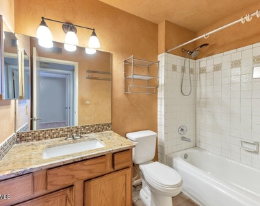 10720 E Mercer Lane - Photo Thumbnail 10