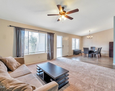 10720 E Mercer Lane - Photo Thumbnail 1