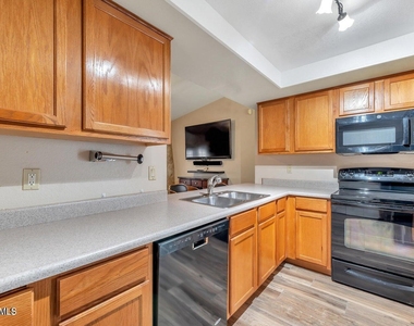 10720 E Mercer Lane - Photo Thumbnail 2