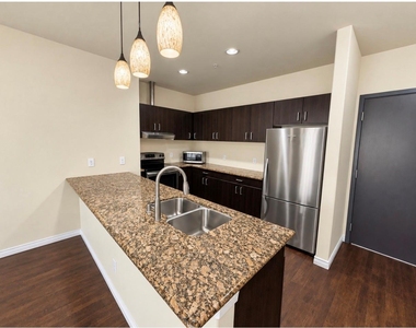 1100 W Trinity Mills Road - Photo Thumbnail 2