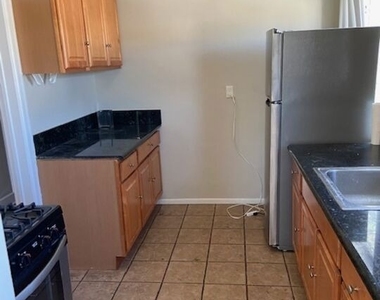 4535 W 11th Place - Photo Thumbnail 9