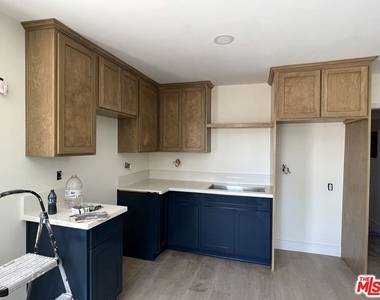 1336 W 37th Drive - Photo Thumbnail 2