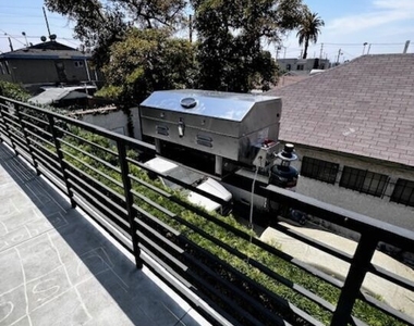 1336 W 37th Drive - Photo Thumbnail 7
