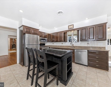 9504 Veirs Drive - Photo Thumbnail 9