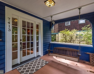 7413 Maple Avenue - Photo Thumbnail 1