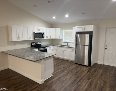 9018 Penny Circle - Photo Thumbnail 2