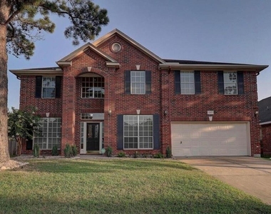 10807 Oak Bayou Lane - Photo Thumbnail 2