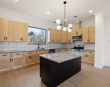 6328 Sidney Street - Photo Thumbnail 8
