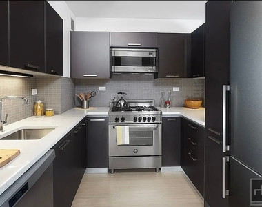 E 39th St - Photo Thumbnail 2