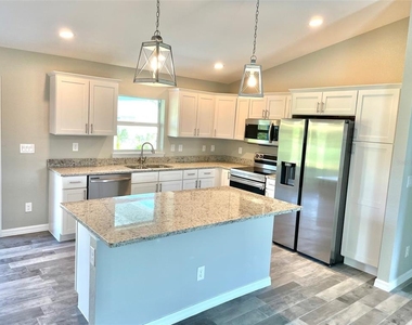 11956 Waterman Ave - Photo Thumbnail 2