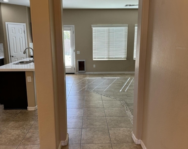 11009 E Sutter Avenue - Photo Thumbnail 2