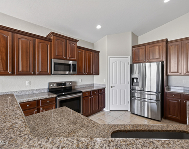 3096 E Kingbird Place - Photo Thumbnail 3