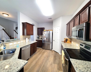 6117 Dark Forest Drive - Photo Thumbnail 3