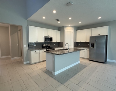 9028 Kingsmoor Way - Photo Thumbnail 2